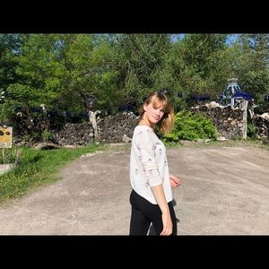 Creme white colored sweater with some details